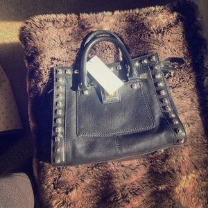 A black Karen Mullen bag